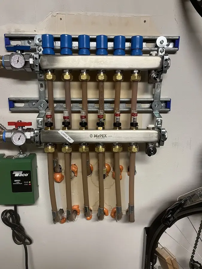 Plumber performing Water Heater Repair at a residential property in Taylor Lake Village